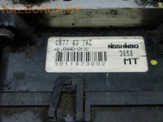 Блок АБС Mazda Premasi Блок АБС Mazda Premasi