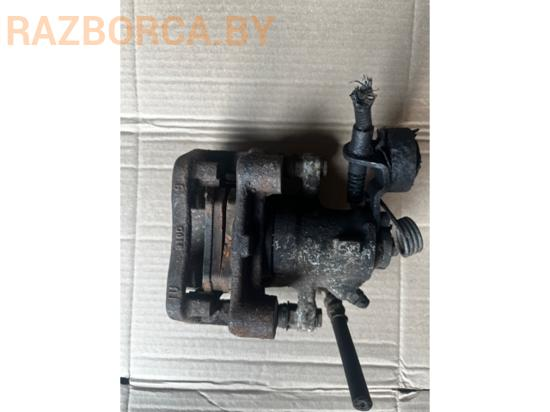 Суппорт задний L Opel Zafira A Суппорт задний L Opel Zafira A