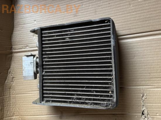 Радиатор кондиционера Nissan Almera Tino