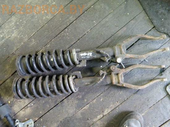 Стойка в сборе передняя L Mazda 6