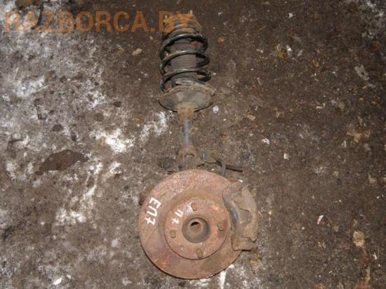 Стойка в сборе передняя R Nissan Almera N16