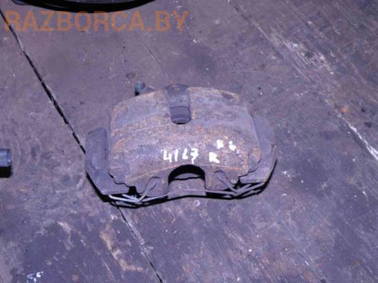 Суппорт передний R Volkswagen Passat B6