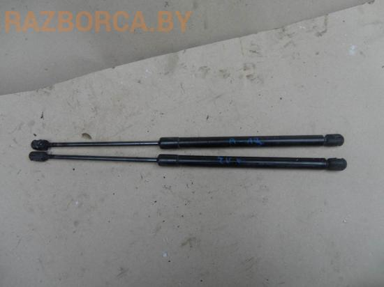 Амортизатор крышки багажника (3-5 двери) Nissan Micra K12 Амортизатор крышки багажника (3-5 двери) Nissan Micra K12